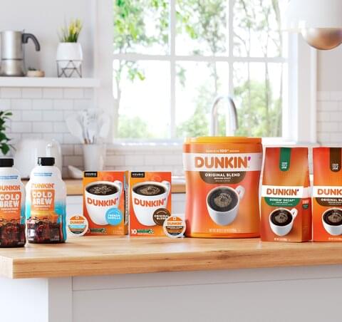 dunkin coffee products sitting on a counter