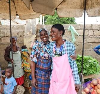 multiple food producers together in a market in africa